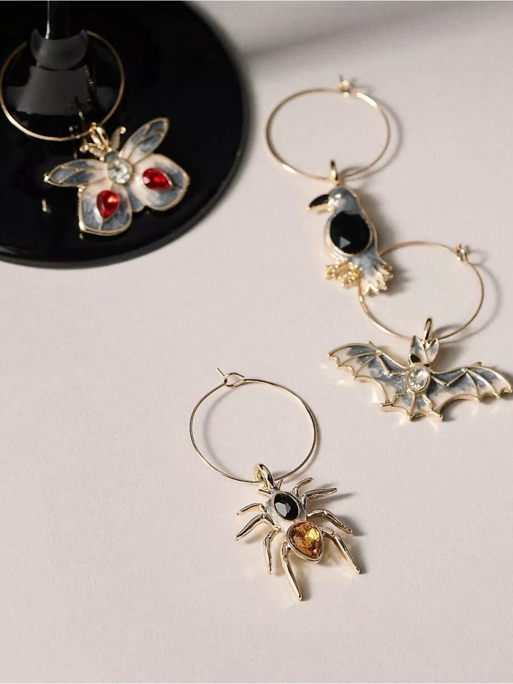 Gold-Tone Spider Drink Charms with Black and Amber Stones